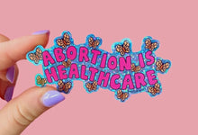 Load image into Gallery viewer, Abortion Is Healthcare Glitter Sticker