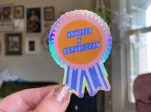 Load image into Gallery viewer, Annoyed A Republican Award Holo- Sticker - Good Judy (.com)